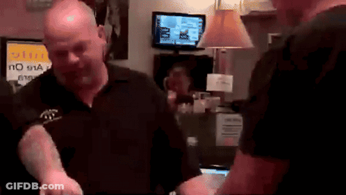 A Man Standing In Front Of A Sign That Says No 911 On It GIF