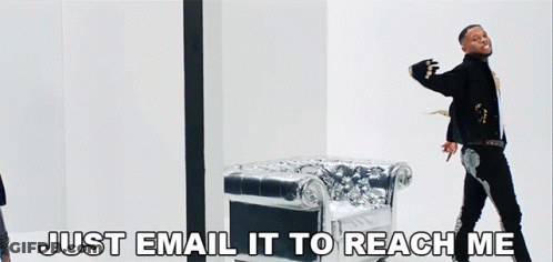 A Man Standing In Front Of A Silver Chair With The Words Just Email It To Reach Me GIF