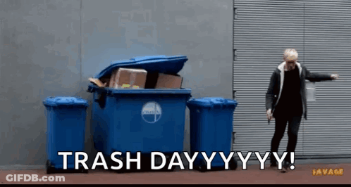 A Man Standing In Front Of A Trash Can That Says Trash Day Yy Yy GIF