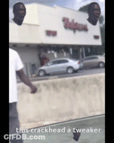 A Man Standing In Front Of A Walgreens Store With A Sign That Says This Crackhead A Tweaker GIF