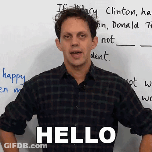 Man Standing In Front Of White Board Saying Hello GIF