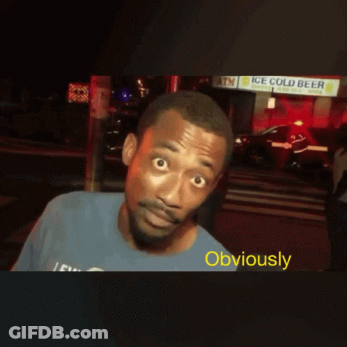 A Man Standing In Front Of An Ice Cold Beer Store GIF