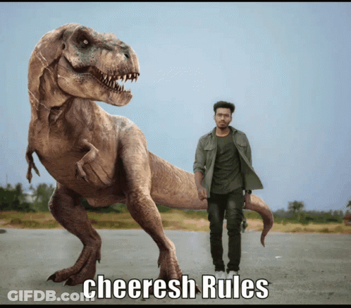 A Man Standing Next To A Large Dinosaur That Says Cheeresh Rules On The Bottom GIF