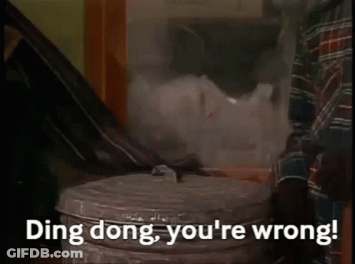A Man Standing Next To A Trash Can With The Words Ding Dong You 'Re Wrong Written On It GIF