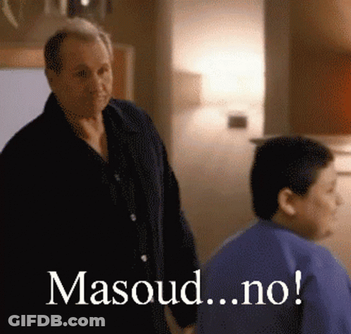 A Man Standing Next To Another Man With The Words Masoud.no Written On The Bottom GIF