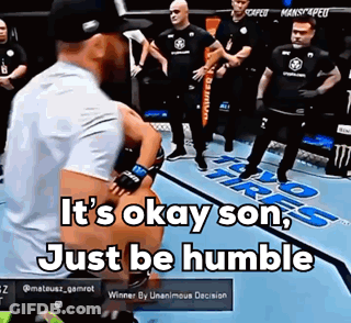 A Man Standing On A Boxing Ring With The Words It 'S Okay Son Just Be Humble GIF