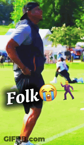 A Man Standing On A Field With The Word Folk Written On The Bottom GIF