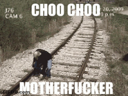 A Man Standing On Train Tracks With The Words Motherfucker On The Bottom GIF