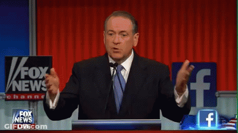 A Man Stands At A Podium In Front Of A Screen That Says Illegals Prostitutes Pimps And Fox News Live GIF