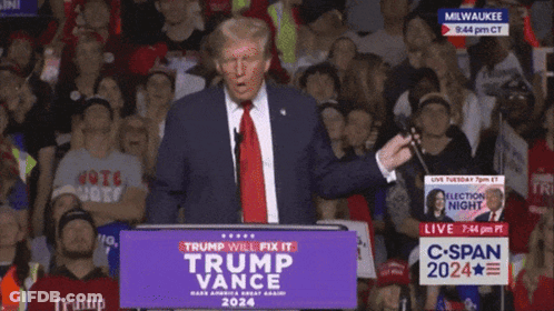 A Man Stands At A Podium That Says Trump Will Fix It On It GIF