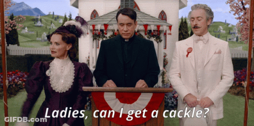 A Man Stands At A Podium With The Words Ladies Can I Get A Cackle Behind Him GIF