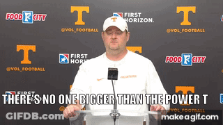 A Man Stands At A Podium With The Words " There 'S No One Bigger Than The Power T " In Front Of Him GIF