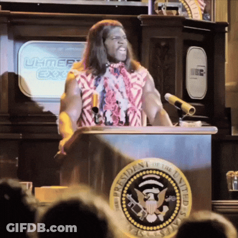 A Man Stands Behind A Podium With The Presidential Seal On It GIF