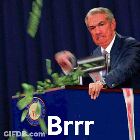A Man Stands Behind A Podium With The Word Brrr Written On It GIF