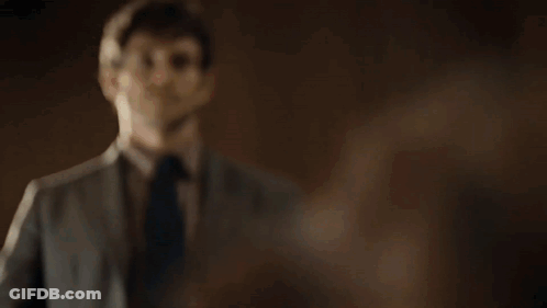 A Man Stands Behind A Podium With The Words Be It Your Own Hand Or The Hand Of God GIF