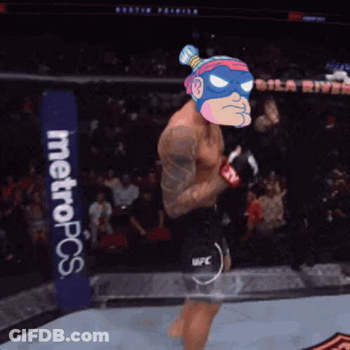 A Man Stands In A Boxing Ring With A Metropcs Sign Behind Him GIF