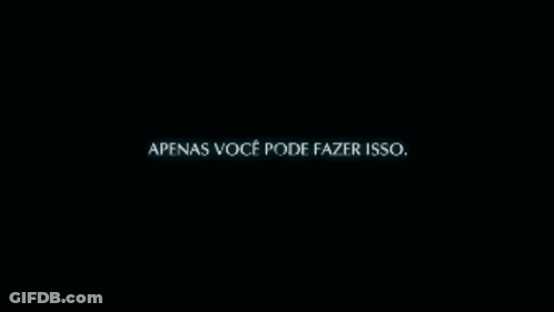 A Man Stands In A Dark Room Surrounded By Boxes And A Wall That Says " Destino " GIF