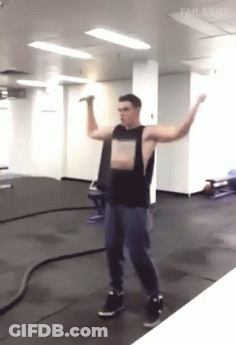 A Man Stands In A Gym With His Arms Outstretched And Failarmy Written On The Bottom GIF