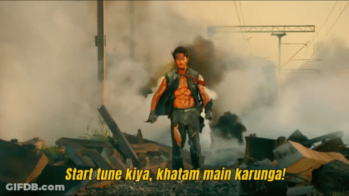 A Man Stands In A Pile Of Rubble With The Words Start Tune Kiya GIF