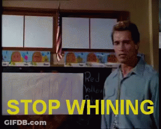 A Man Stands In Front Of A Blackboard With The Words Stop Whining GIF