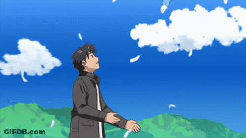 A Man Stands In Front Of A Blue Sky With Clouds GIF