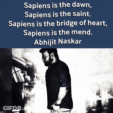 A Man Stands In Front Of A Book Shelf With A Quote By Abhijit Naskar GIF