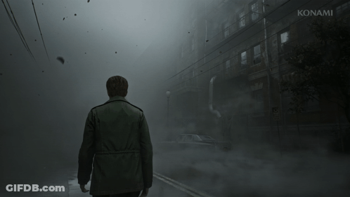 A Man Stands In Front Of A Building That Says Konami On The Bottom GIF