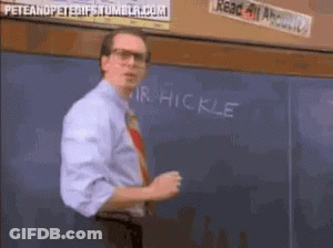 A Man Stands In Front Of A Chalkboard That Says " Mr Hickle " GIF