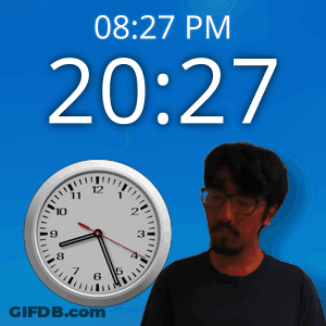 A Man Stands In Front Of A Clock That Says 20:27 GIF