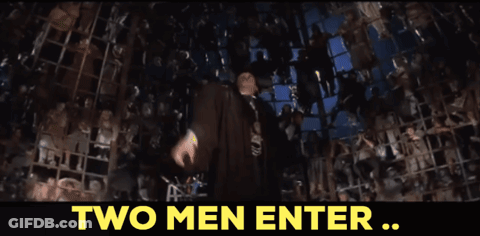 A Man Stands In Front Of A Crowd With The Words One Man Leaves Above Him GIF