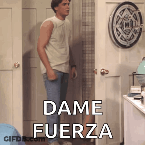 A Man Stands In Front Of A Door With Dame Fuerza Written On It GIF