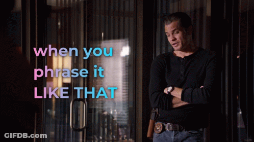 A Man Stands In Front Of A Glass Door With The Words When You Phrase It Like That Above Him GIF