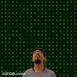 A Man Stands In Front Of A Green Background With Stars And The Number 26 GIF