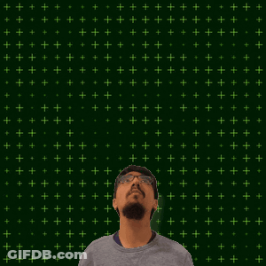A Man Stands In Front Of A Green Background With The Number 11 + 15 On It GIF