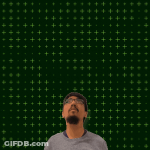 A Man Stands In Front Of A Green Background With The Number 14 GIF