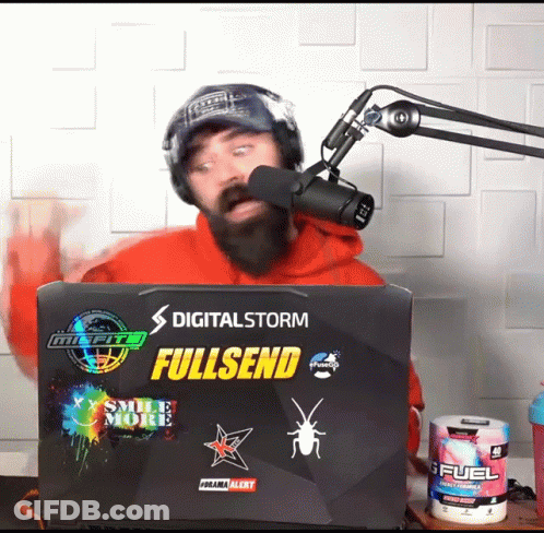 A Man Stands In Front Of A Laptop That Says Digitalstorm Fullsend GIF