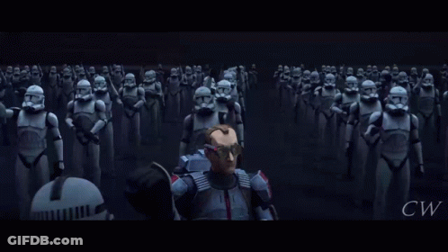A Man Stands In Front Of A Large Group Of Stormtroopers With Cw Written On The Bottom GIF