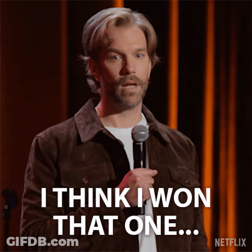 A Man Stands In Front Of A Microphone And Says I Think I Won That One GIF