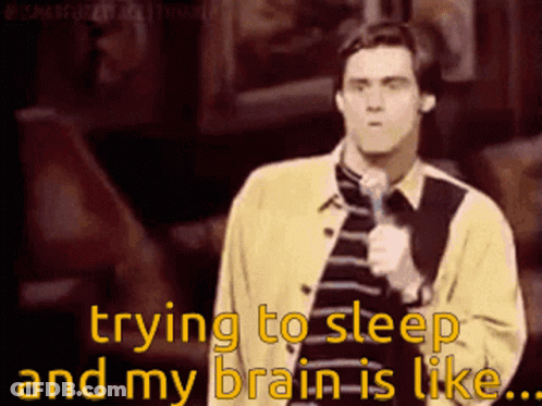 A Man Stands In Front Of A Microphone With The Words Trying To Sleep And My Brain Is Like GIF