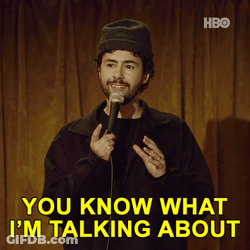 A Man Stands In Front Of A Microphone With The Words You Know What I 'M Talking About Above Him GIF