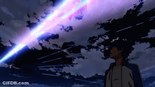 A Man Stands In Front Of A Purple And Blue Sky With Stars GIF