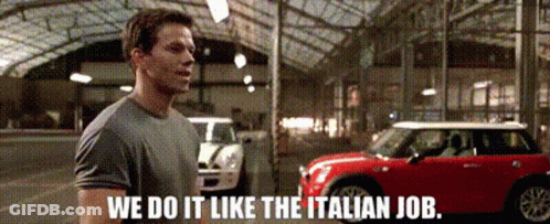A Man Stands In Front Of A Red Mini Cooper And Says We Do It Like The Italian Job . GIF