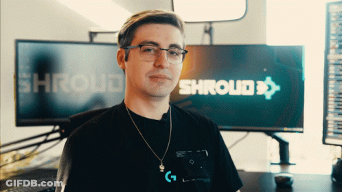 A Man Stands In Front Of A Shroud Sign GIF