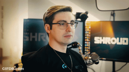 A Man Stands In Front Of A Shroud Sign GIF