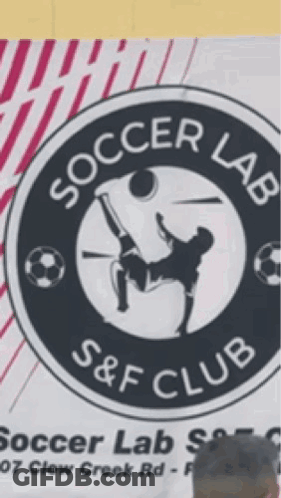 A Man Stands In Front Of A Sign For Soccer Lab GIF