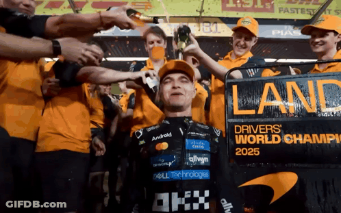 A Man Stands In Front Of A Sign That Says Land On It GIF