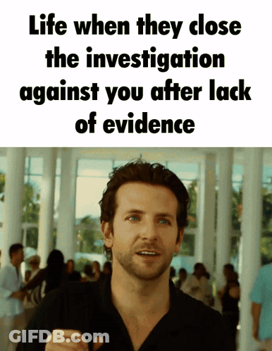 A Man Stands In Front Of A Sign That Says Life When They Close The Investigation Against You After Lack Of Evidence GIF