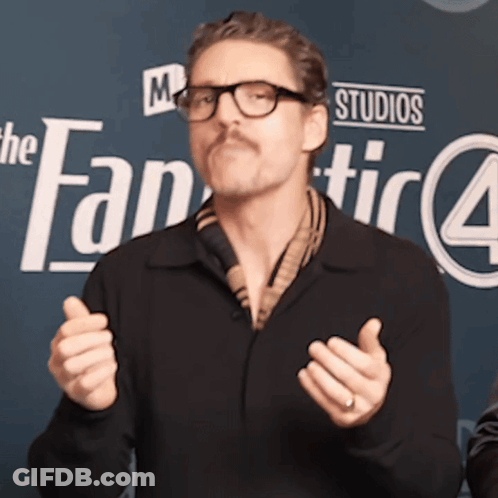 A Man Stands In Front Of A Sign That Says The Fantastic 4 GIF
