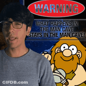 A Man Stands In Front Of A Sign That Says Warning GIF