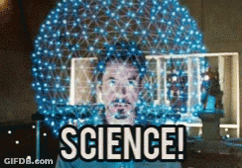 A Man Stands In Front Of A Sphere With The Words Science Written On It GIF